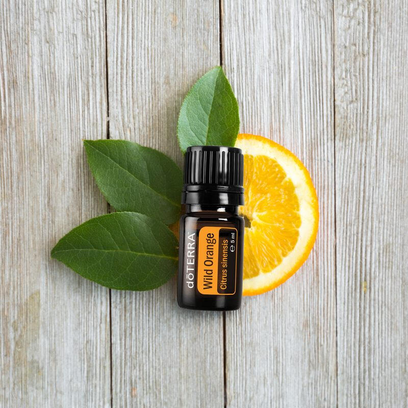 Citrus Oil to Win! Wild Orange Oil on juicy orange fruits